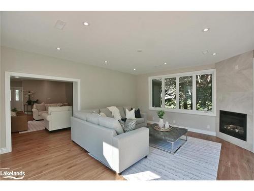 4 Laurel Boulevard, Collingwood, ON - Indoor Photo Showing Living Room With Fireplace