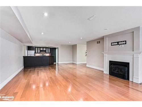 112 Cortina Crescent, The Blue Mountains, ON - Indoor Photo Showing Living Room With Fireplace