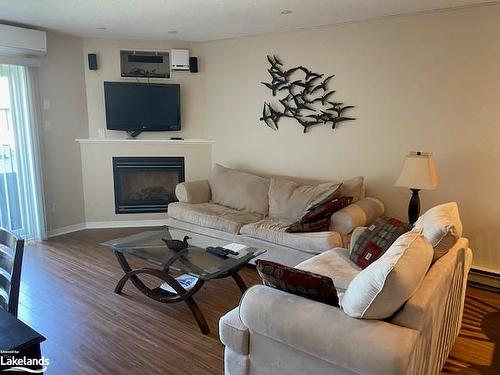 347 Mariners Way, Collingwood, ON - Indoor Photo Showing Living Room With Fireplace