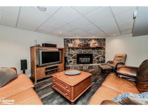 51 Mary Lake Crescent, Port Sydney, ON - Indoor Photo Showing Living Room With Fireplace