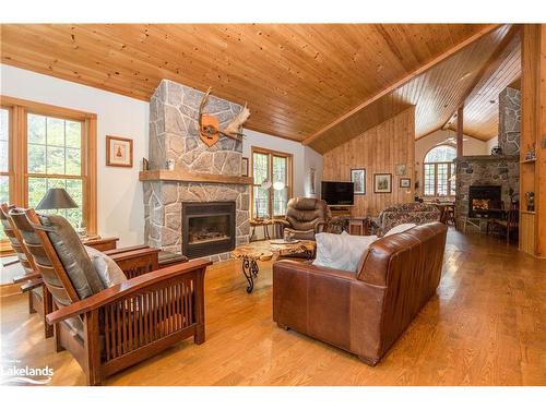 1143 Leonard Lake Rd 1, Muskoka Lakes, ON - Indoor Photo Showing Living Room With Fireplace