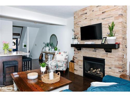 13-68 Webb Circle, Haliburton, ON - Indoor Photo Showing Living Room With Fireplace