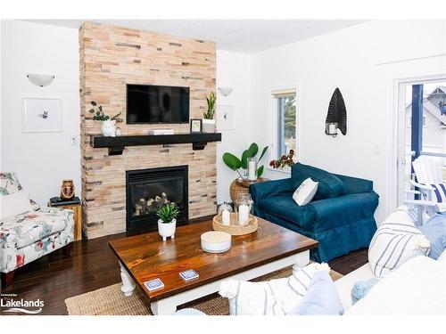 13-68 Webb Circle, Haliburton, ON - Indoor Photo Showing Living Room With Fireplace