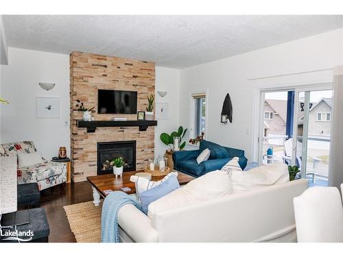 13-68 Webb Circle, Haliburton, ON - Indoor Photo Showing Living Room With Fireplace