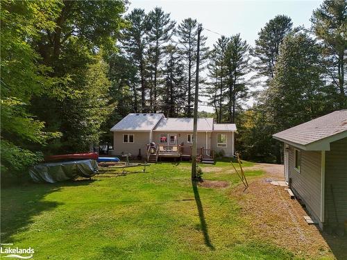 1041 Big Island Road, Bracebridge, ON - Outdoor With Deck Patio Veranda With Backyard