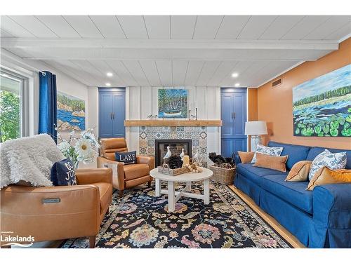 106-10 Coveside Drive, Huntsville, ON - Indoor Photo Showing Living Room With Fireplace