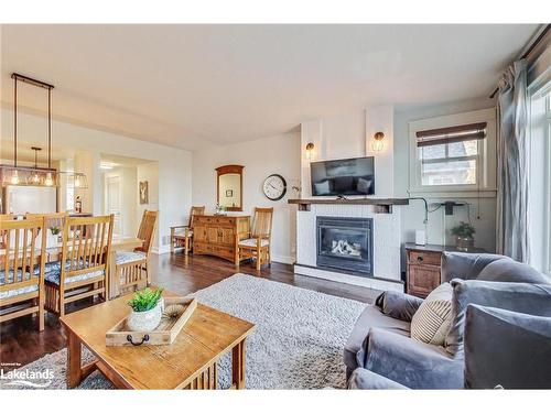 202-115 Fairway Court, Town Of Blue Mountains, ON - Indoor Photo Showing Living Room With Fireplace