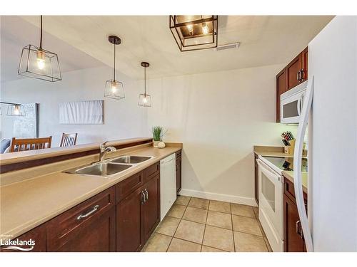 202-115 Fairway Court, Town Of Blue Mountains, ON - Indoor Photo Showing Kitchen With Double Sink