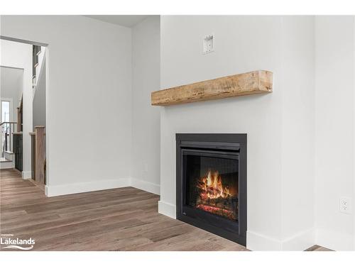 141 White Oak Crescent, The Blue Mountains, ON - Indoor Photo Showing Living Room With Fireplace