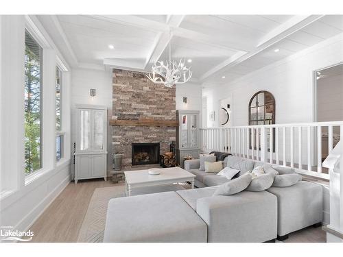 27 Playfair Island, Seguin, ON - Indoor Photo Showing Living Room With Fireplace