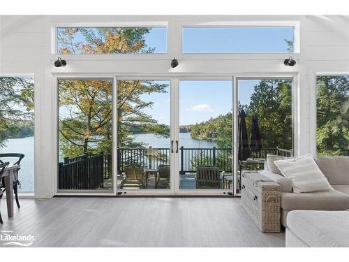 27 Playfair Island, Seguin, ON - Indoor Photo Showing Living Room With Body Of Water