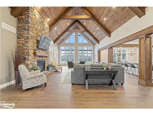 34 St Georges Court, Huntsville, ON - Indoor Photo Showing Living Room With Fireplace