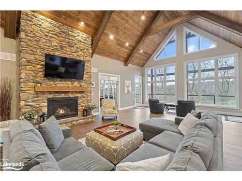 34 St Georges Court, Huntsville, ON - Indoor Photo Showing Living Room With Fireplace