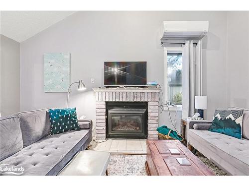 11-442 Oxbow Crescent, Collingwood, ON - Indoor Photo Showing Living Room With Fireplace