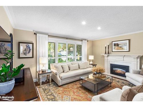 119 5Th Avenue E, Owen Sound, ON - Indoor Photo Showing Living Room With Fireplace