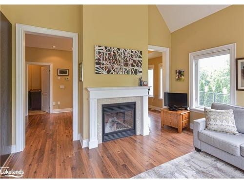 1-10 Invermara Court, Orillia, ON - Indoor Photo Showing Living Room With Fireplace