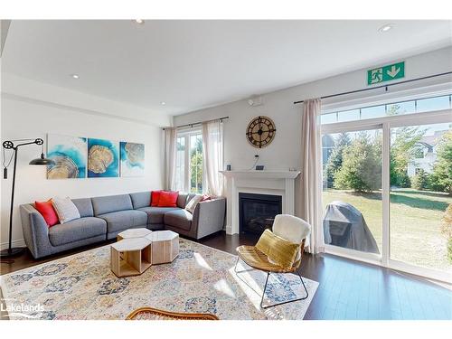 31-171 Snowbridge Way, The Blue Mountains, ON - Indoor Photo Showing Living Room With Fireplace