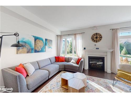 31-171 Snowbridge Way, The Blue Mountains, ON - Indoor Photo Showing Living Room With Fireplace