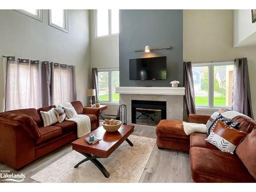 218-169 Jozo Weider Boulevard, The Blue Mountains, ON - Indoor Photo Showing Living Room With Fireplace