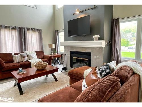 218-169 Jozo Weider Boulevard, The Blue Mountains, ON - Indoor Photo Showing Living Room With Fireplace