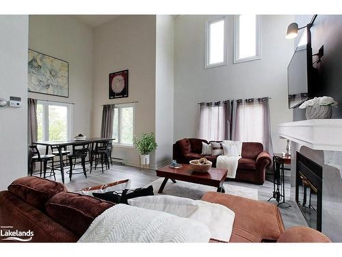 218-169 Jozo Weider Boulevard, The Blue Mountains, ON - Indoor Photo Showing Living Room With Fireplace