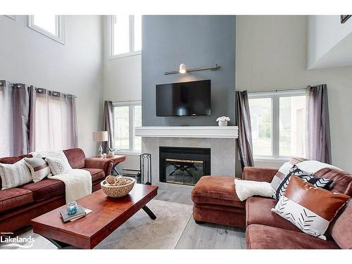 218-169 Jozo Weider Boulevard, The Blue Mountains, ON - Indoor Photo Showing Living Room With Fireplace