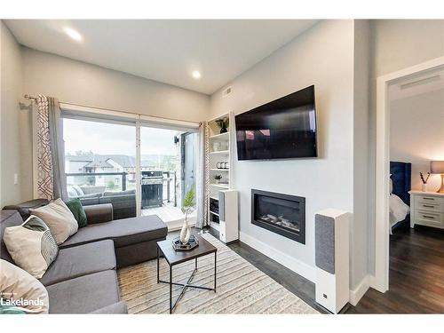 301-10 Beausoleil Lane, The Blue Mountains, ON - Indoor Photo Showing Living Room With Fireplace