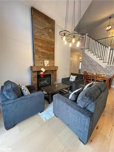 31 Hughes Street, Collingwood, ON - Indoor Photo Showing Other Room With Fireplace