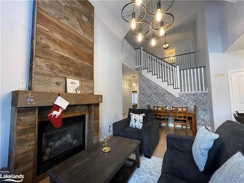 31 Hughes Street, Collingwood, ON - Indoor Photo Showing Living Room With Fireplace