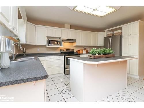 13 Riverdale Drive, Wasaga Beach, ON - Indoor Photo Showing Kitchen With Double Sink