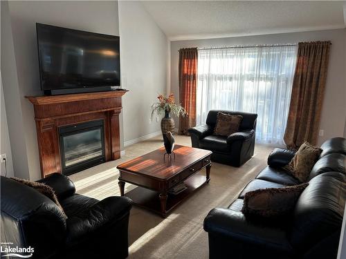 50 Silver Crescent, Collingwood, ON - Indoor Photo Showing Living Room With Fireplace