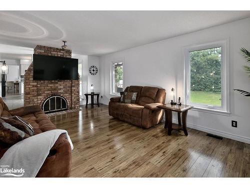 17 Mckean Boulevard, Nottawa, ON - Indoor Photo Showing Living Room With Fireplace