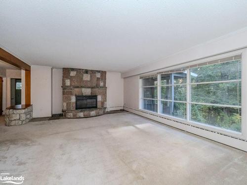 20 Hamilton Street, Bracebridge, ON - Indoor Photo Showing Living Room With Fireplace