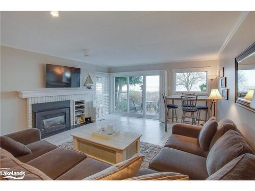 24-44 Trott Boulevard, Collingwood, ON - Indoor Photo Showing Living Room With Fireplace