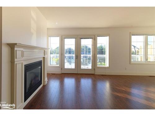 4-64 River Road E, Wasaga Beach, ON - Indoor With Fireplace