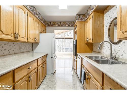 61 Beaufort Crescent, Tiny, ON - Indoor Photo Showing Kitchen With Double Sink