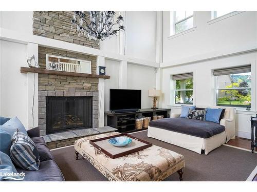 129 Snowbridge Way, The Blue Mountains, ON - Indoor Photo Showing Living Room With Fireplace