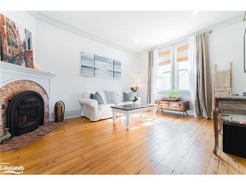 79 Mcmurray Street, Bracebridge, ON - Indoor Photo Showing Living Room With Fireplace