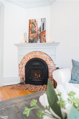 79 Mcmurray Street, Bracebridge, ON - Indoor Photo Showing Living Room With Fireplace