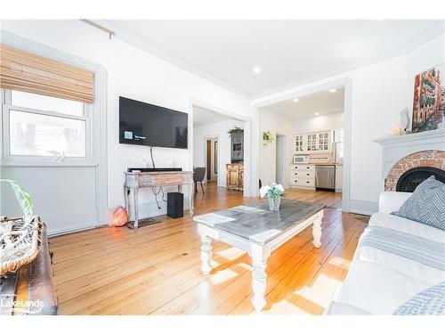 79 Mcmurray Street, Bracebridge, ON - Indoor Photo Showing Living Room With Fireplace