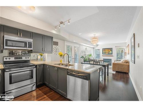 201-4 Brandy Lane Drive, Collingwood, ON - Indoor Photo Showing Kitchen With Stainless Steel Kitchen With Double Sink