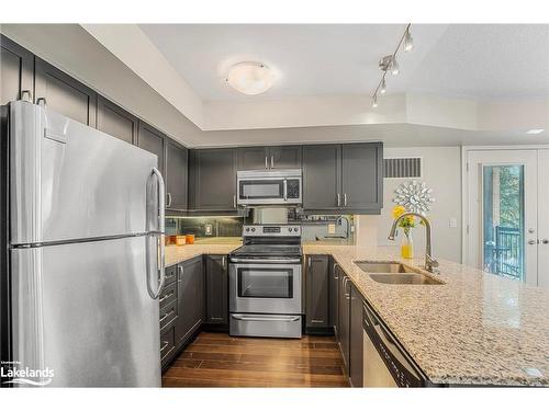 201-4 Brandy Lane Drive, Collingwood, ON - Indoor Photo Showing Kitchen With Stainless Steel Kitchen With Double Sink