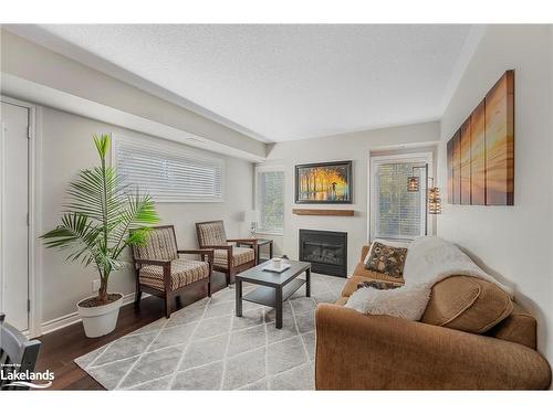 201-4 Brandy Lane Drive, Collingwood, ON - Indoor Photo Showing Living Room With Fireplace