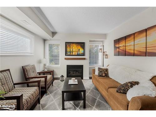 201-4 Brandy Lane Drive, Collingwood, ON - Indoor Photo Showing Living Room With Fireplace