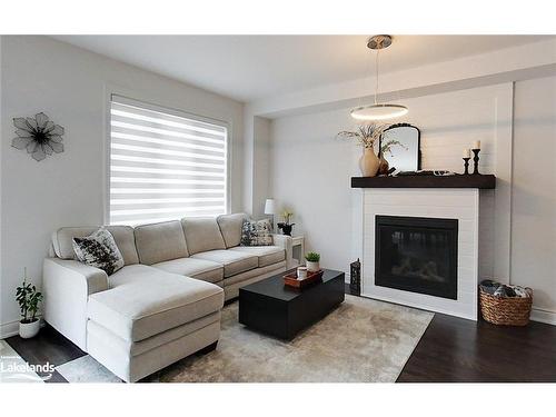 30 Autumn Drive, Wasaga Beach, ON - Indoor Photo Showing Living Room With Fireplace