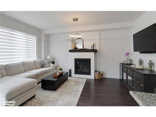 30 Autumn Drive, Wasaga Beach, ON - Indoor Photo Showing Living Room With Fireplace