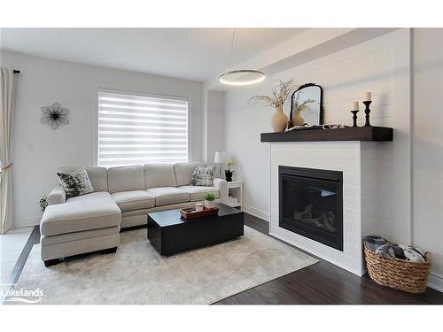 30 Autumn Drive, Wasaga Beach, ON - Indoor Photo Showing Living Room With Fireplace