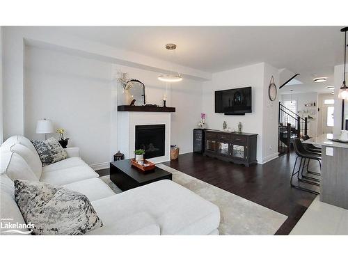 30 Autumn Drive, Wasaga Beach, ON - Indoor Photo Showing Living Room With Fireplace