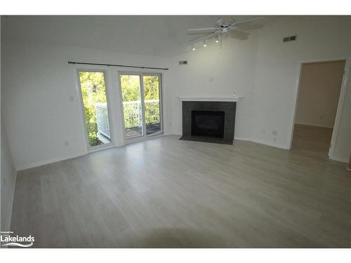 148-53 Trott Boulevard, Collingwood, ON - Indoor Photo Showing Living Room With Fireplace