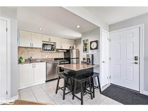 605-796468 19 Grey Road, The Blue Mountains, ON - Indoor Photo Showing Kitchen With Stainless Steel Kitchen